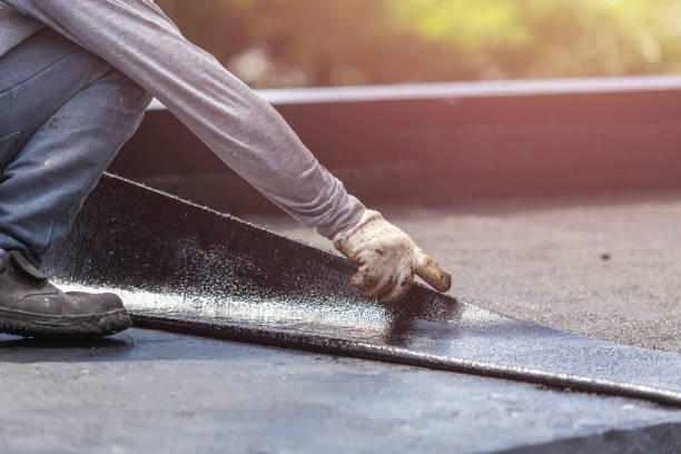 Professional Waterproofing technician working in Young America, IN